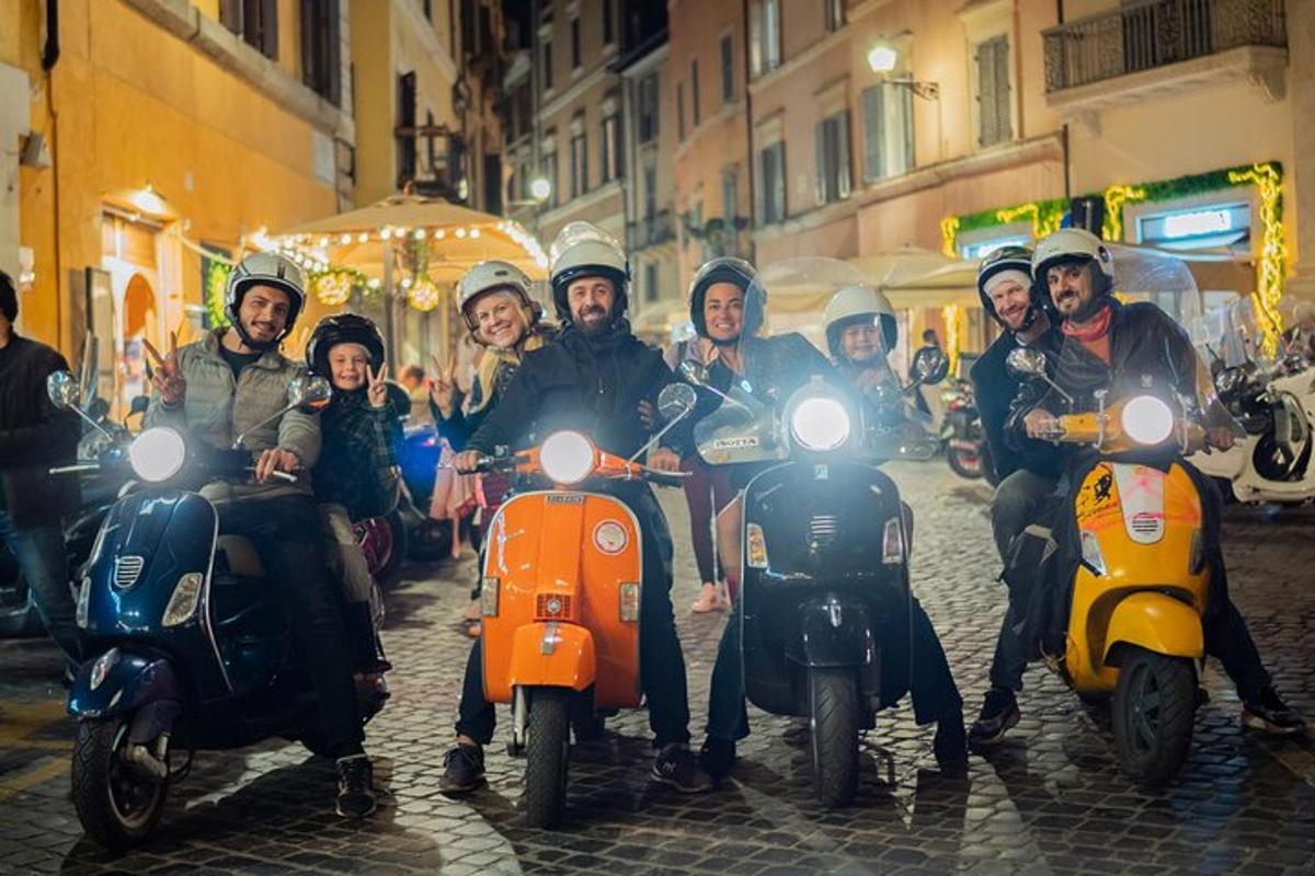 un gruppo di persone in motocicletta lungo una strada