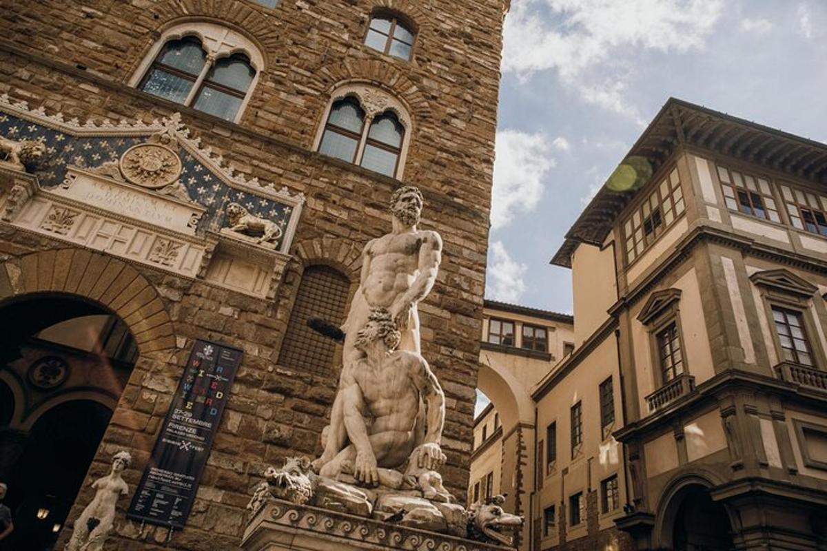 a statue of a man in front of a building