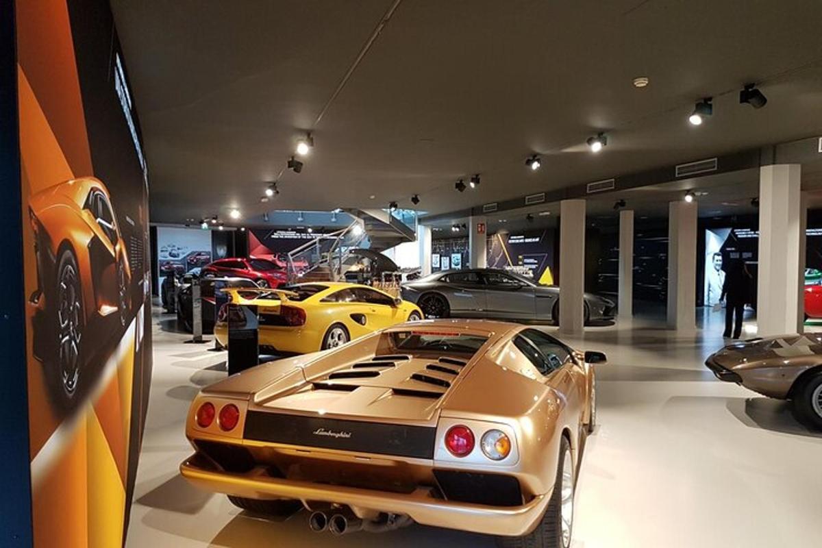 a car showroom with several cars on display
