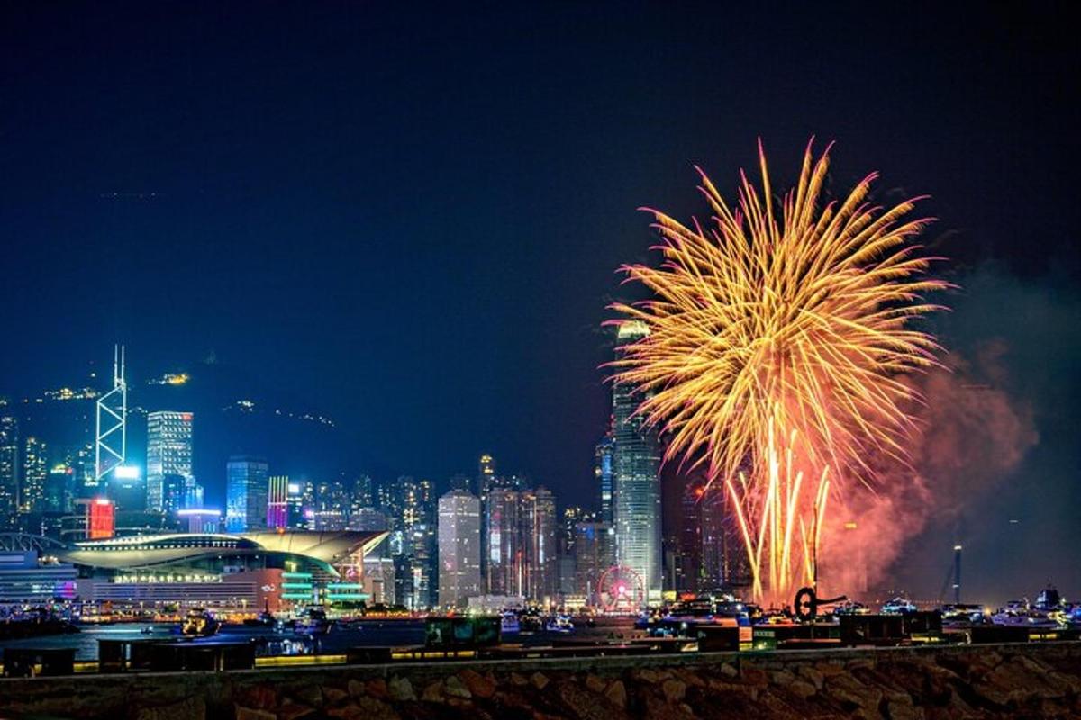 a fireworks display over a city at night