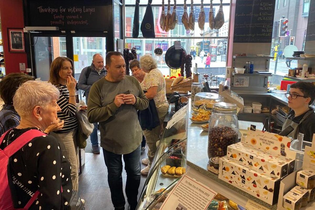 a group of people standing in a grocery store