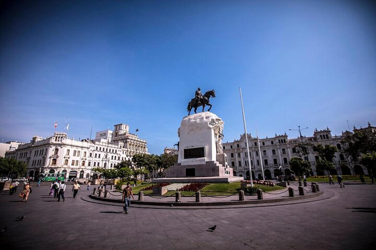 a statue of a man riding a horse in a plaza
