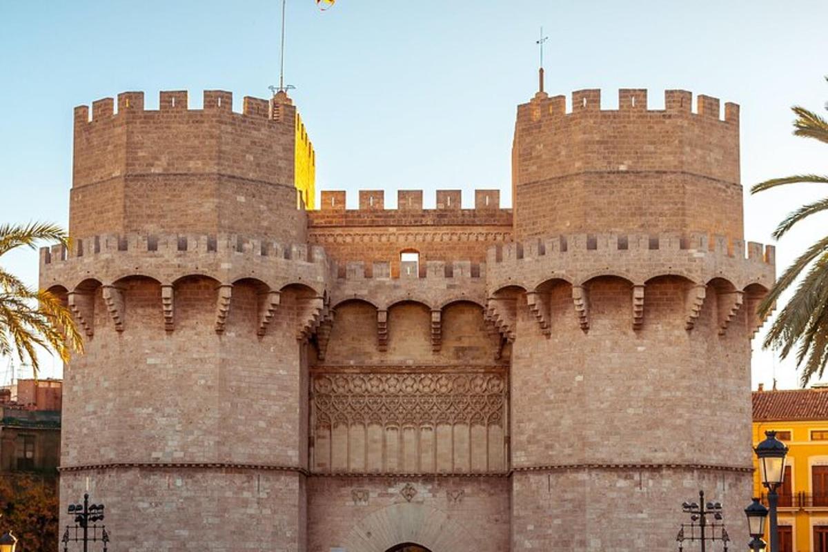 a large brick building with two towers