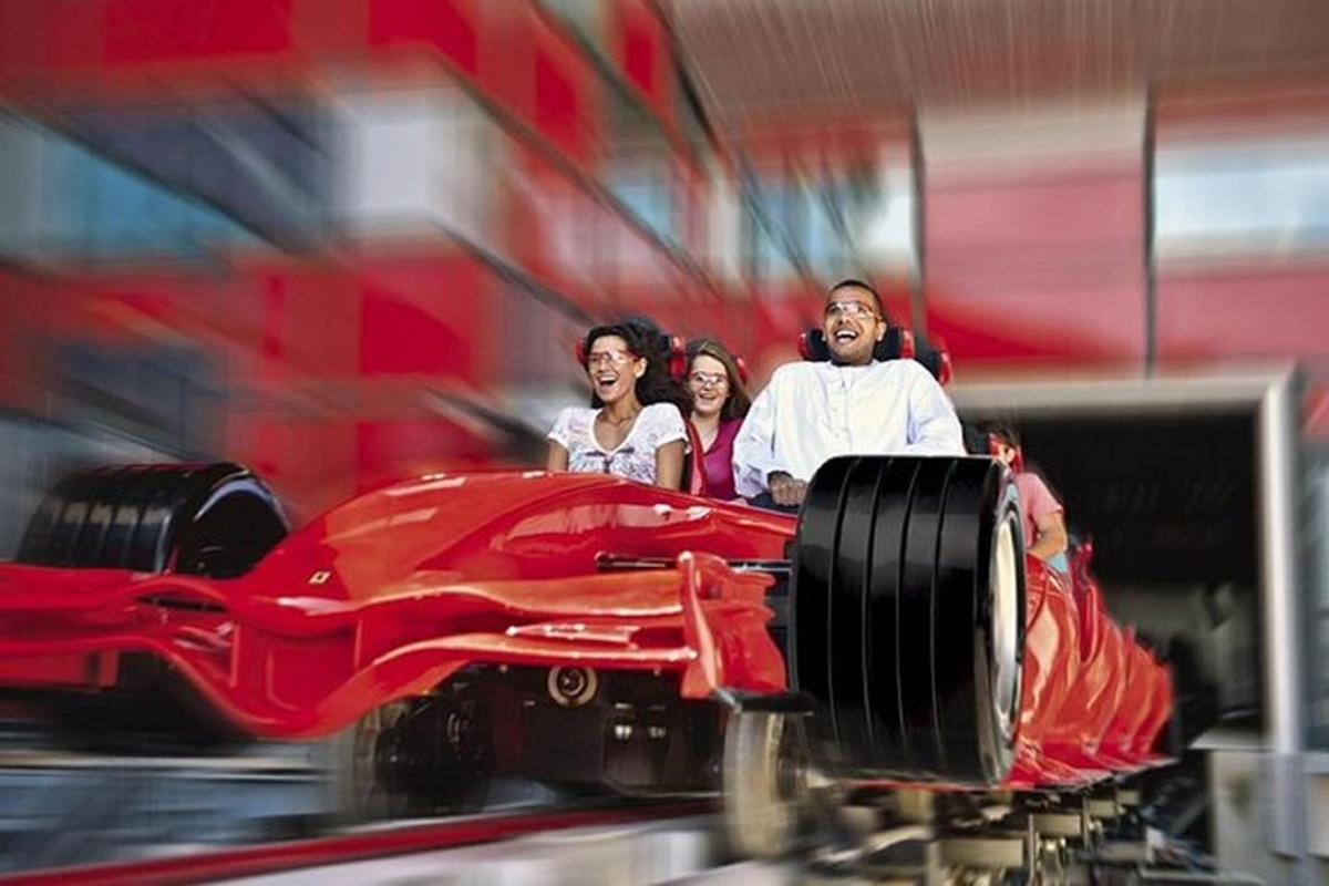 a group of people standing next to a red car
