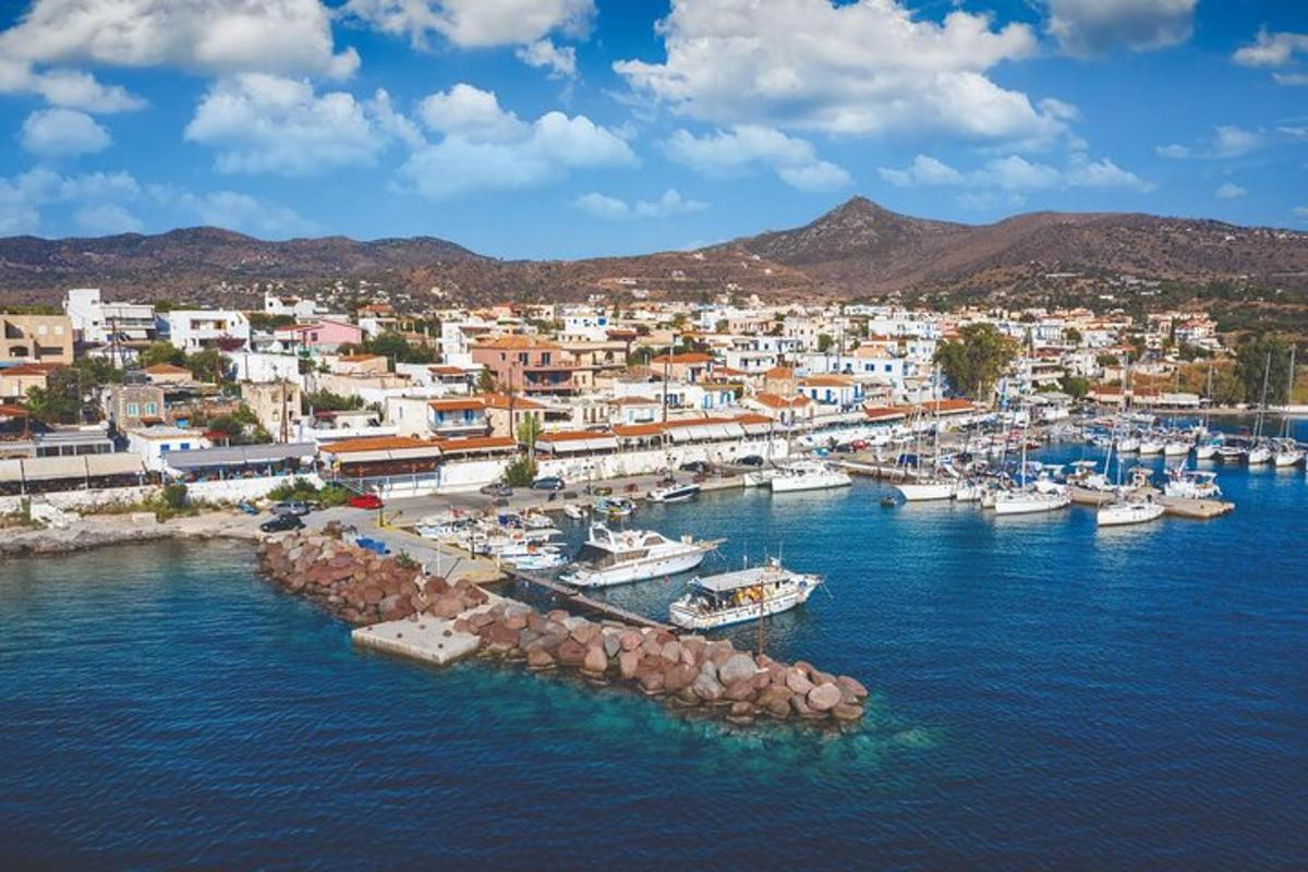 an aerial view of a harbor with boats in the water