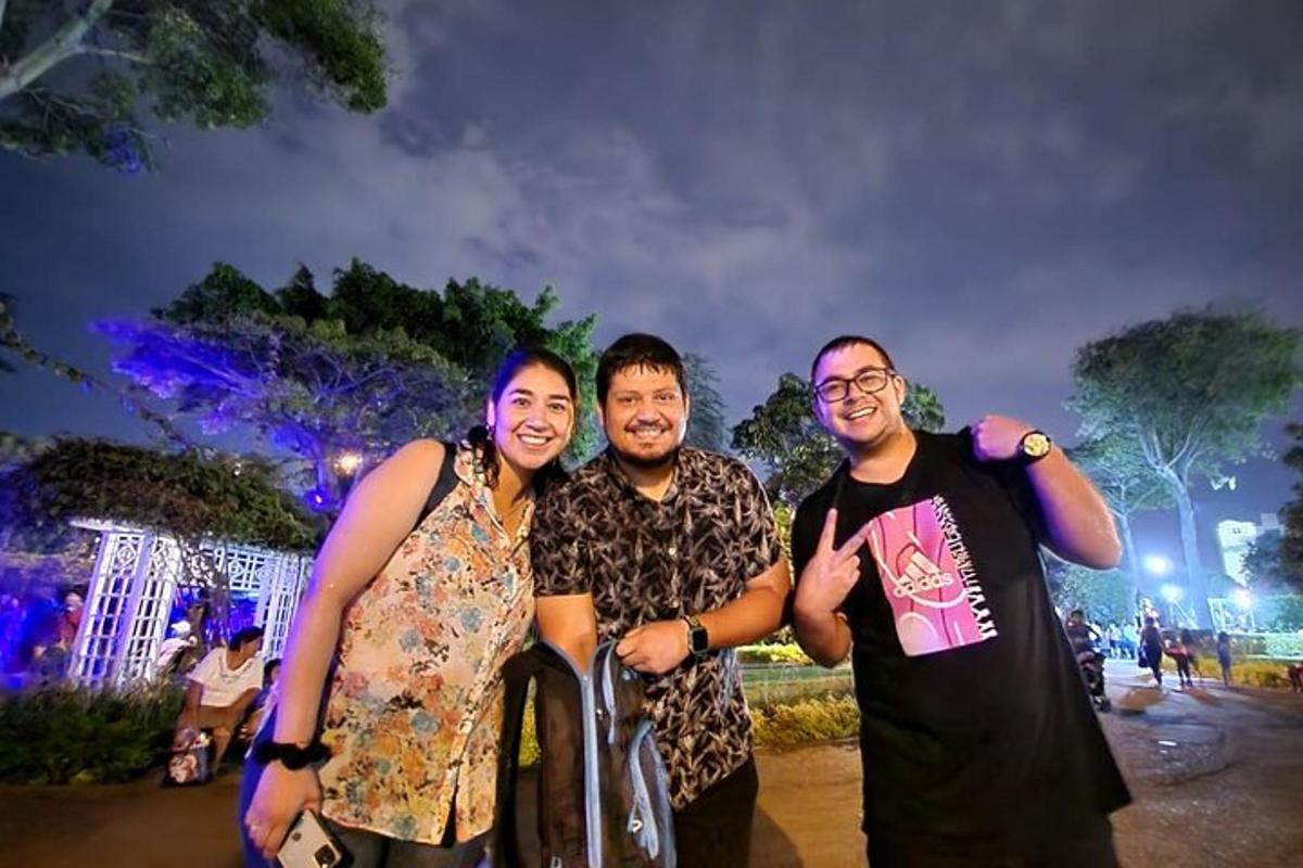 a group of three people posing for a picture