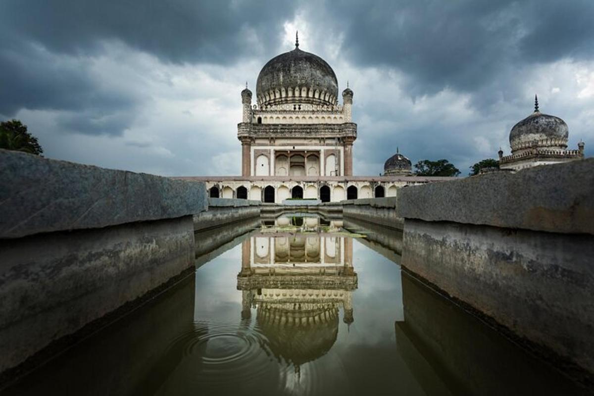 a building with a reflection in a body of water