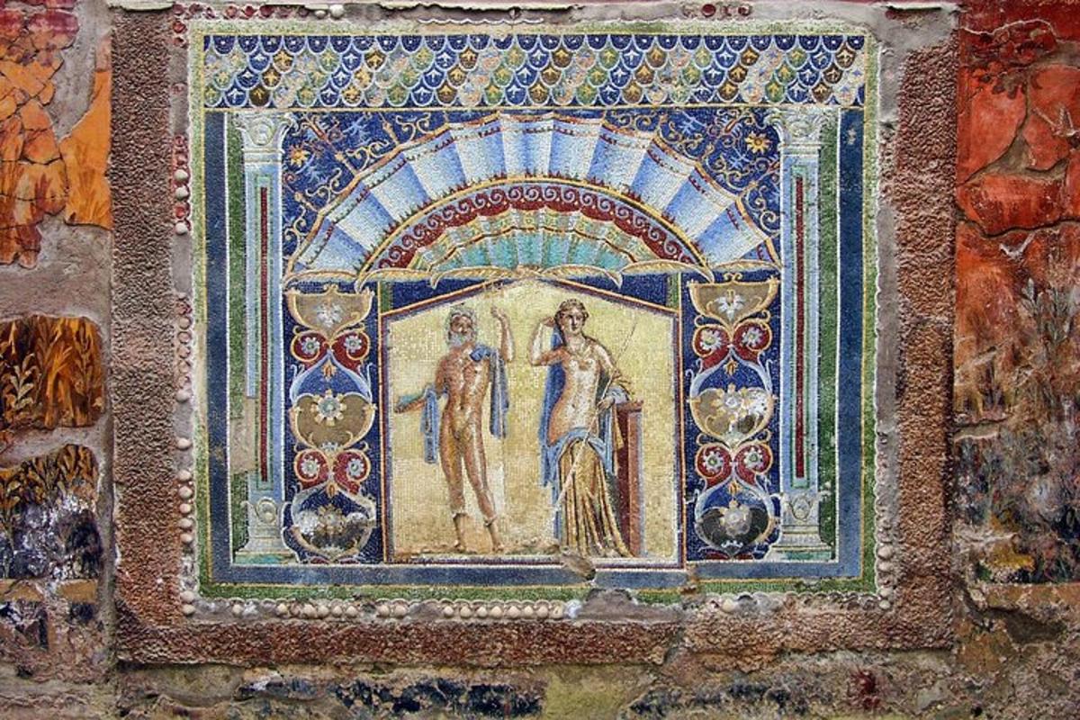 a mosaic of two people on a wall