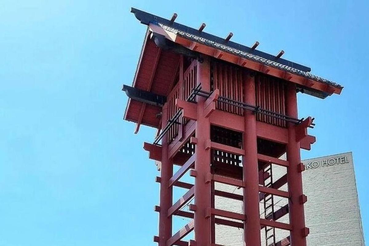 a building with a red tower on top of it