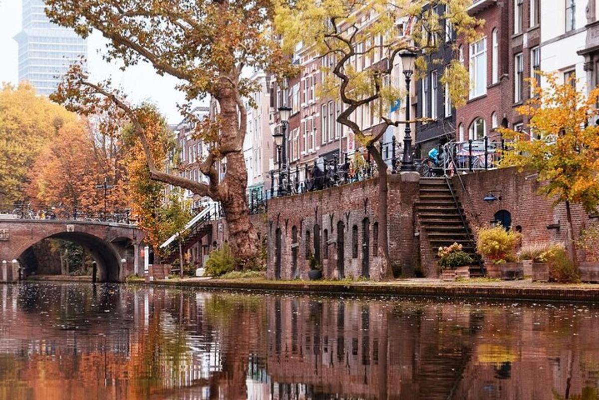 a view of a river with buildings and a bridge