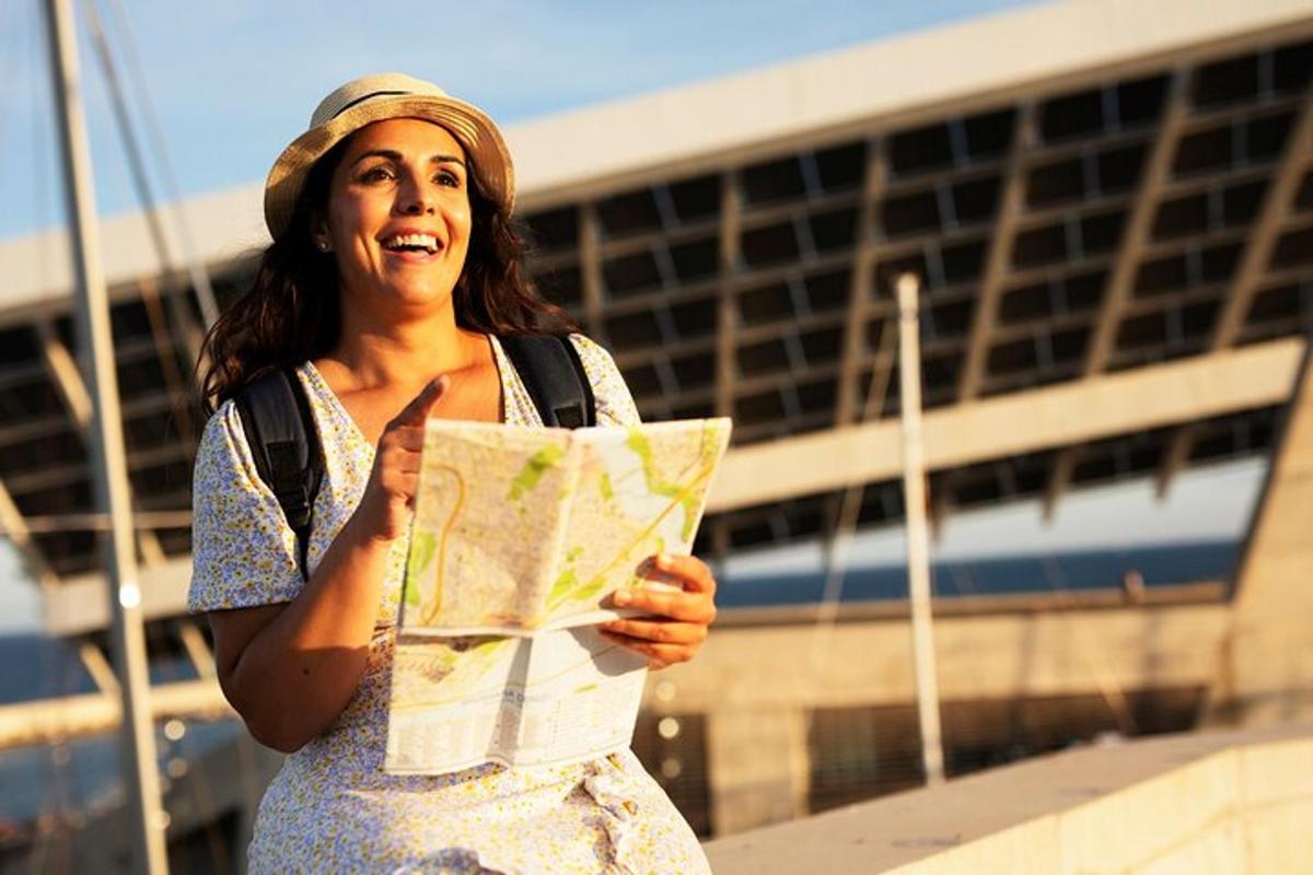 a woman holding a map in front of a building