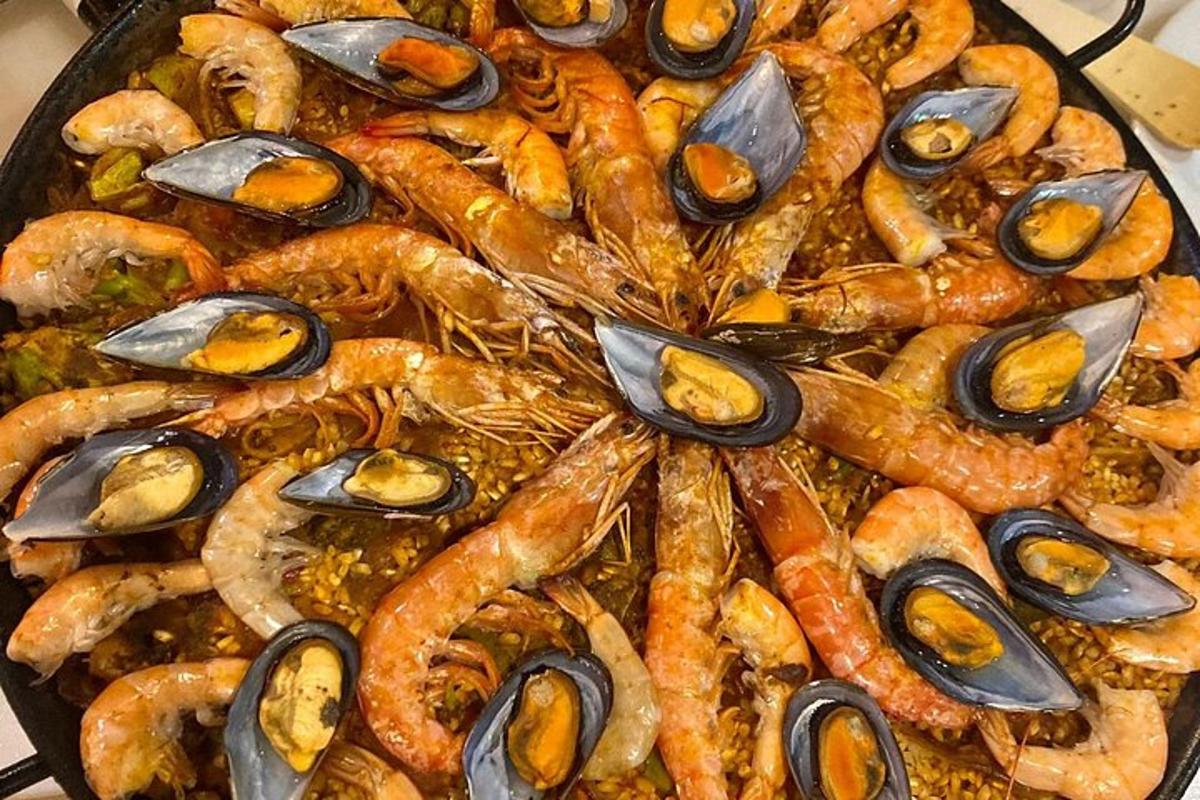 a bunch of shrimp and oysters in a pan