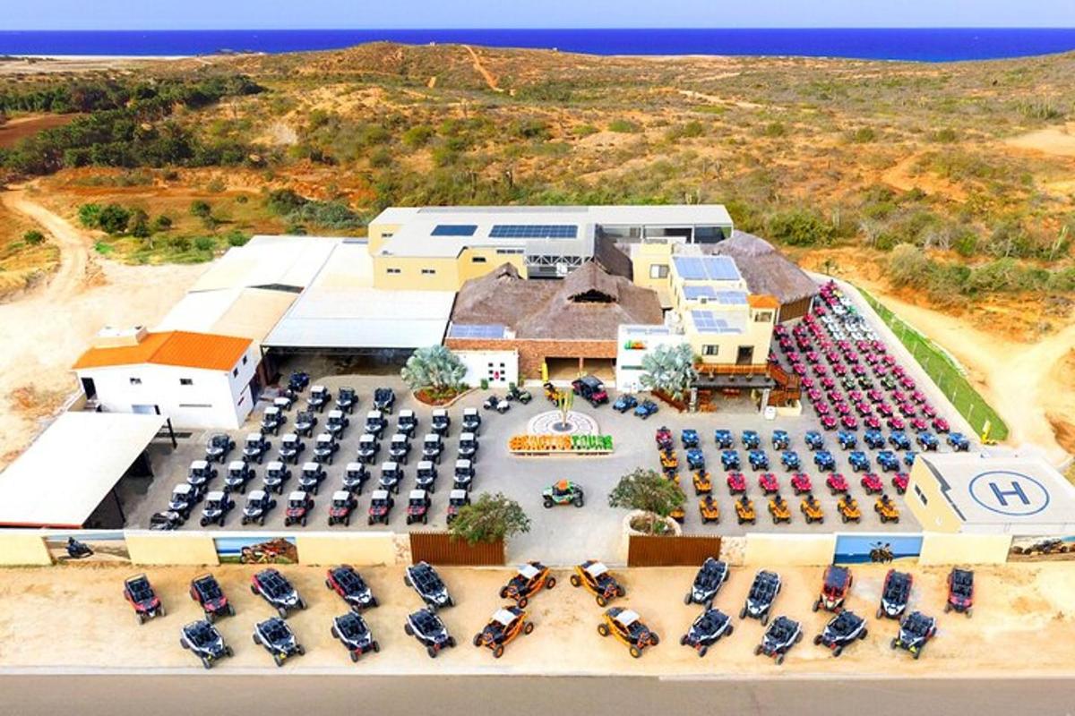 arial view of a resort with a lot of umbrellas