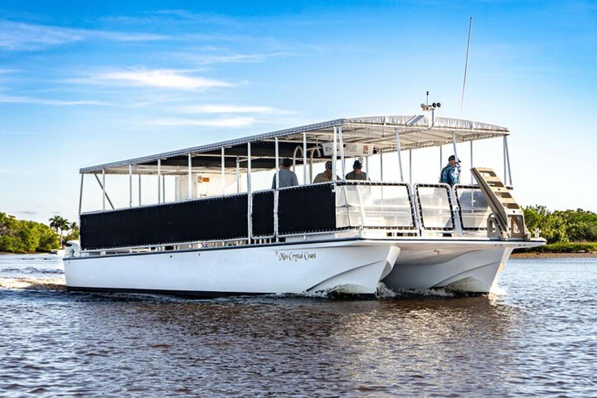 a boat with people on it on the water