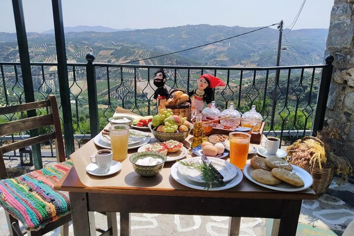 a table with food and drinks on top of a balcony