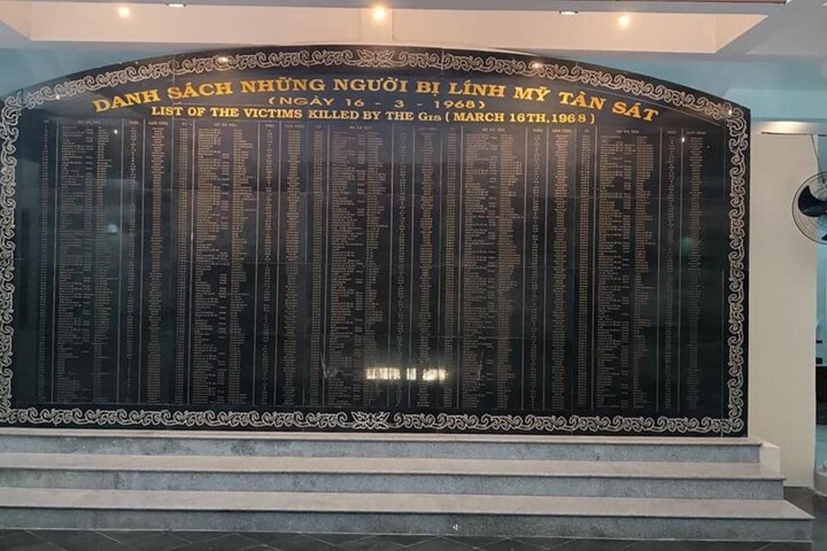 a large war memorial on the top of stairs