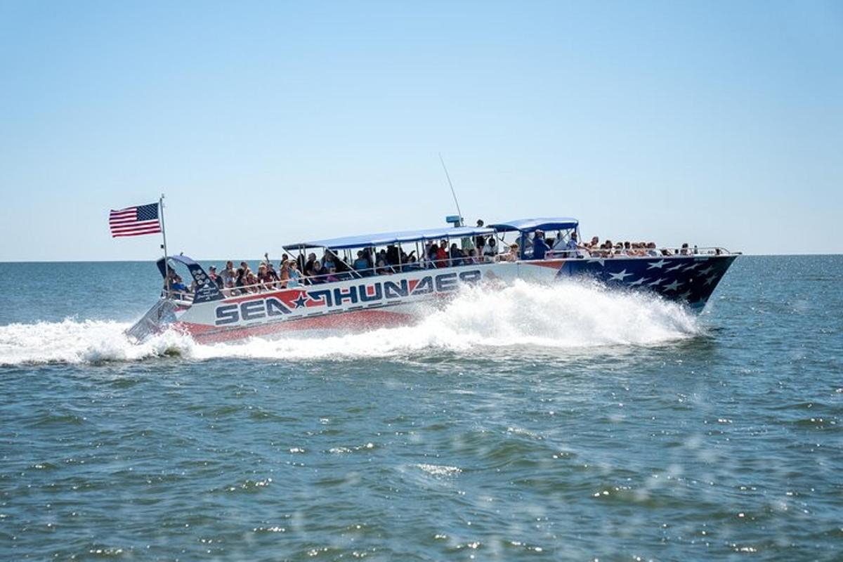 a group of people riding on a boat in the water