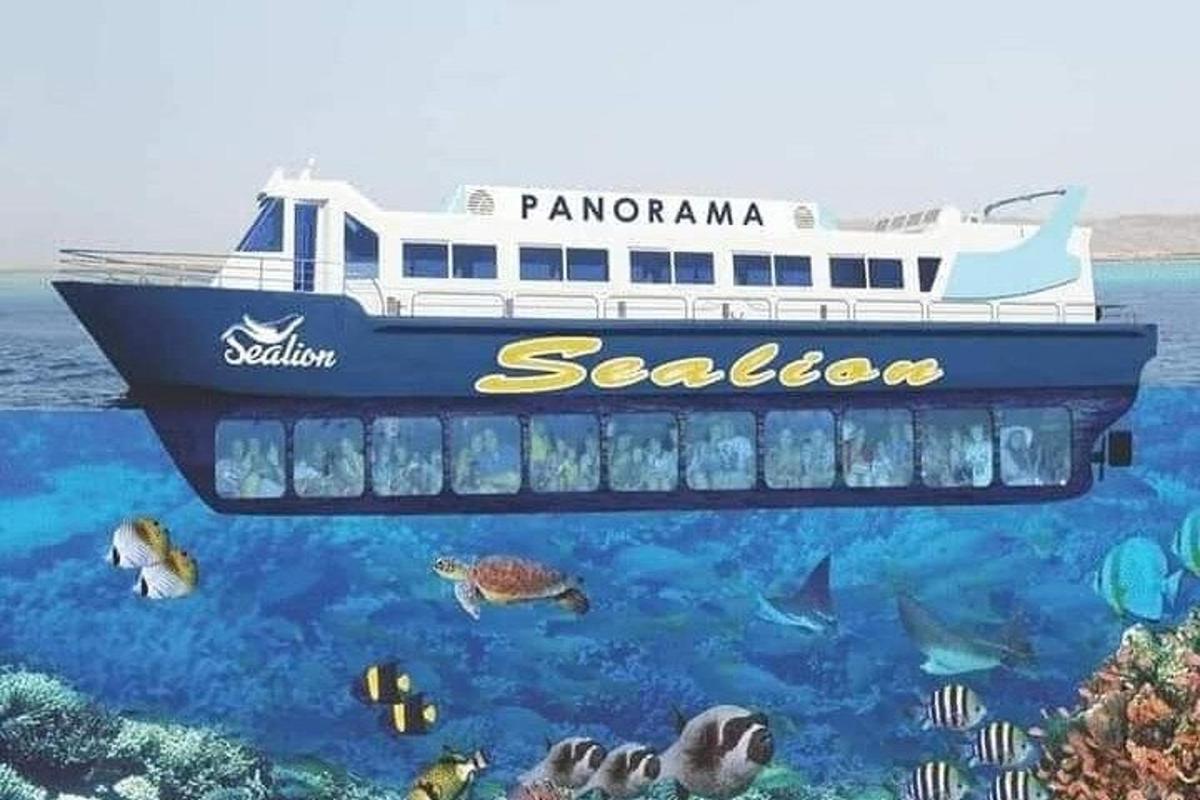 a ship in the ocean with fish in the water