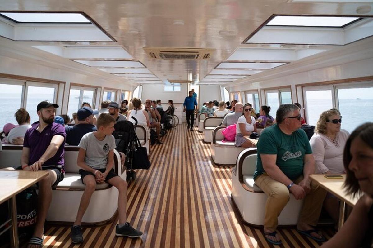 a group of people sitting on a train