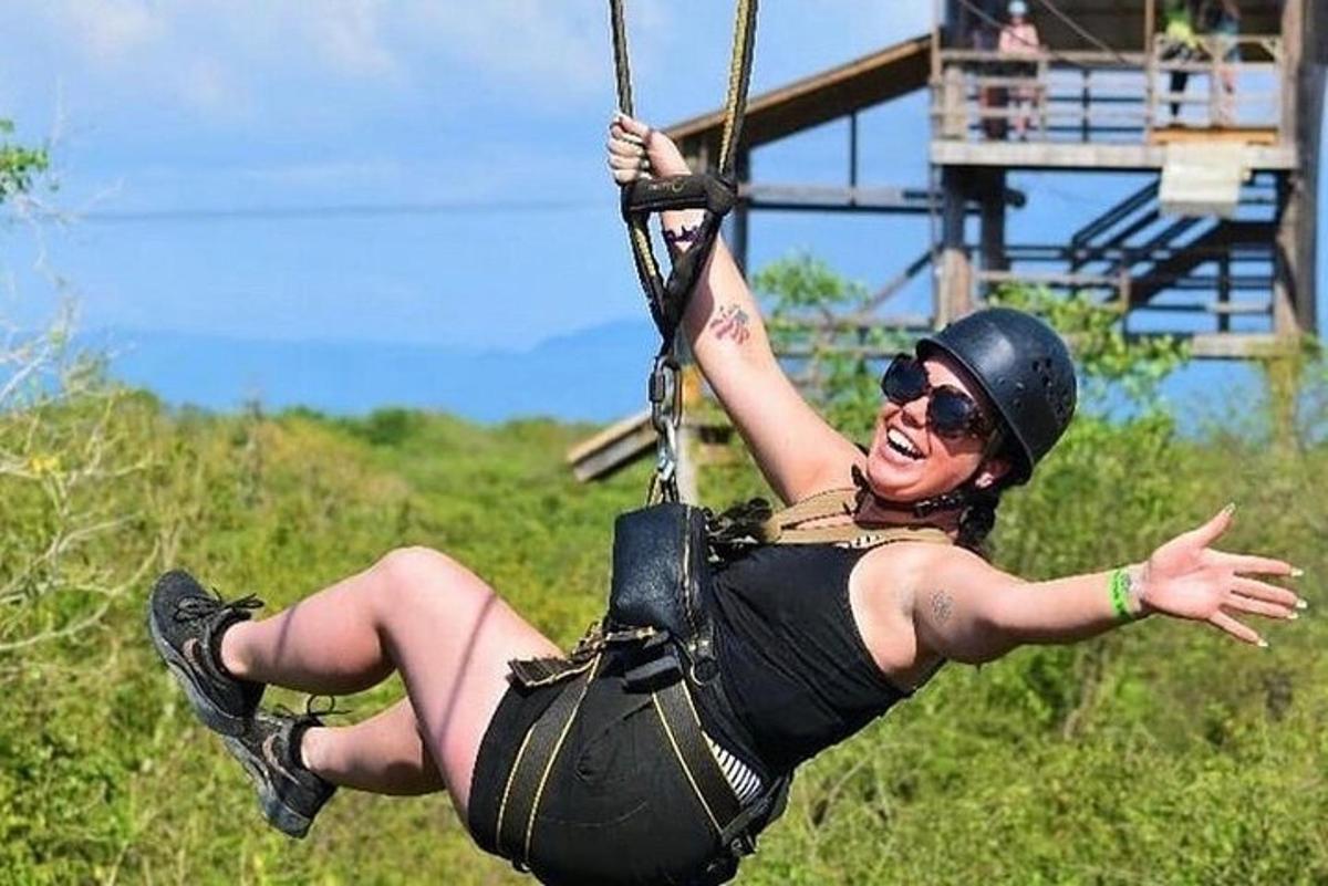 a woman is on a rope swing