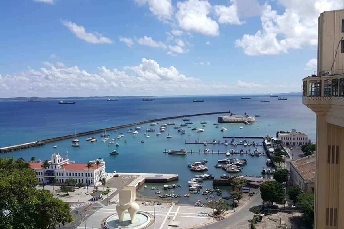 a view of a harbor with boats in the water