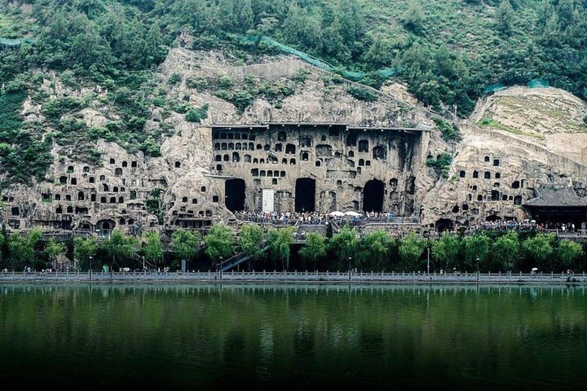 an old building next to a body of water