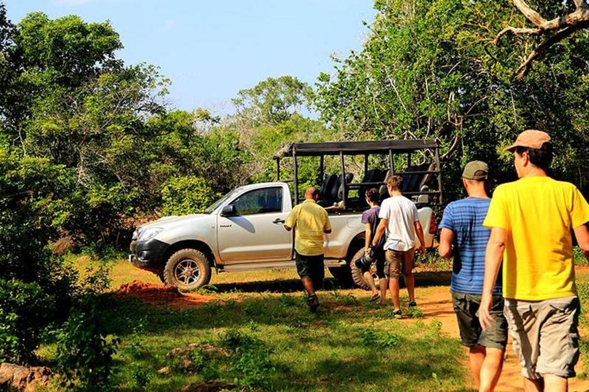 a group of people standing in front of a truck