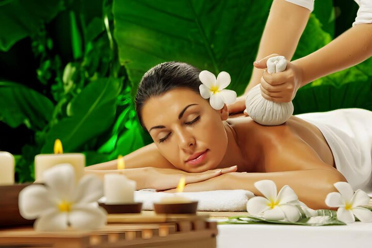 a woman getting a massage in a spa salon