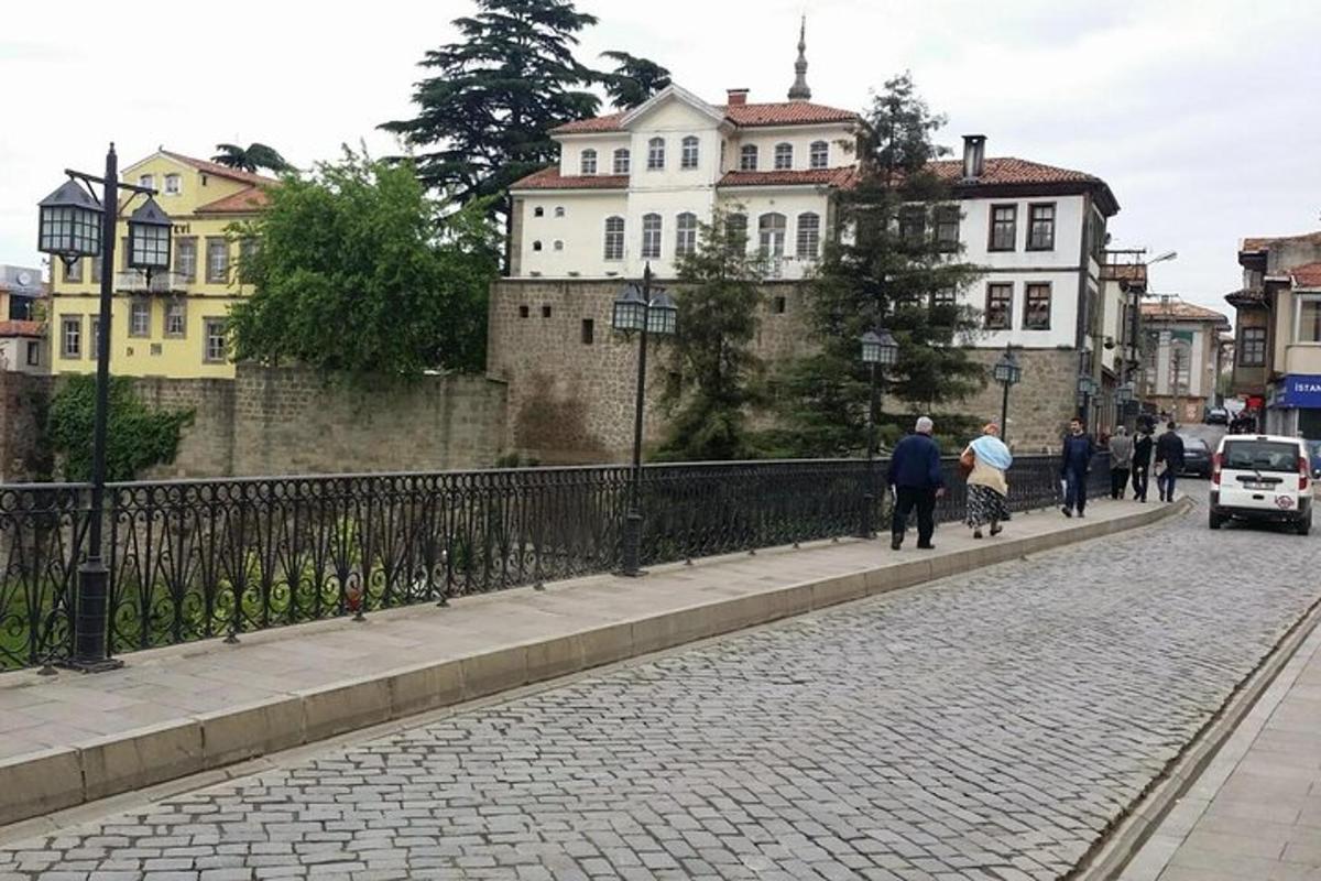 a group of people walking down a street