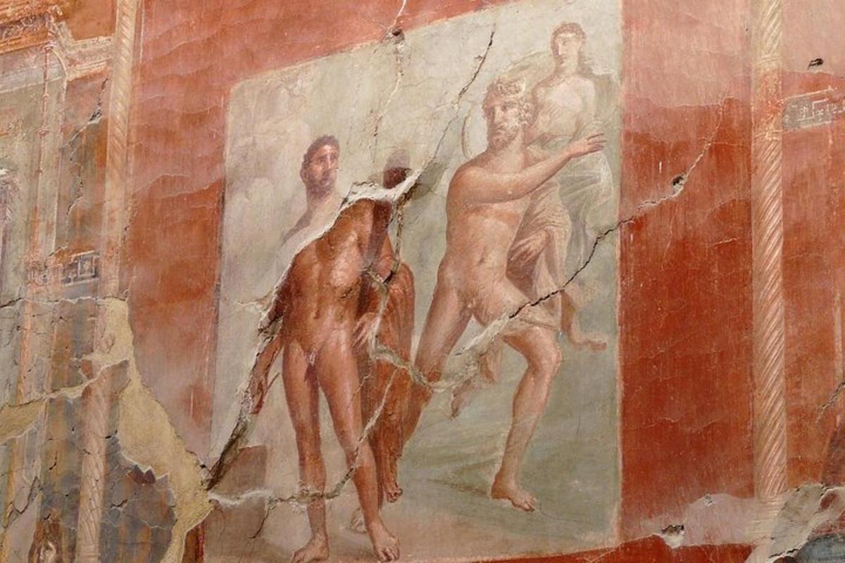 ένας πίνακας τριών ανδρών σε έναν τοίχο