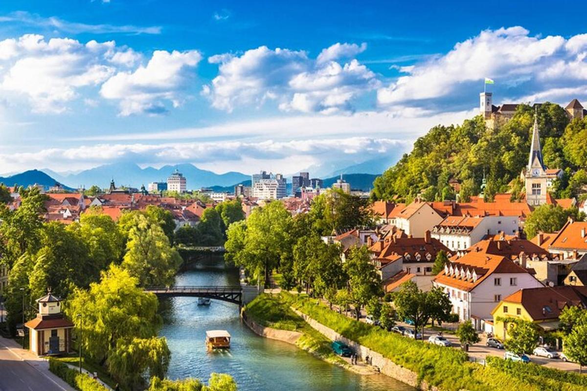 a river flowing through a town with a city