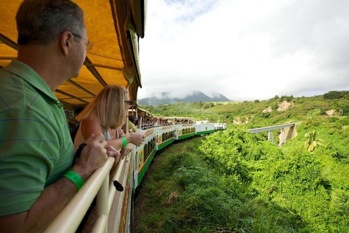 a man and a woman riding on a train
