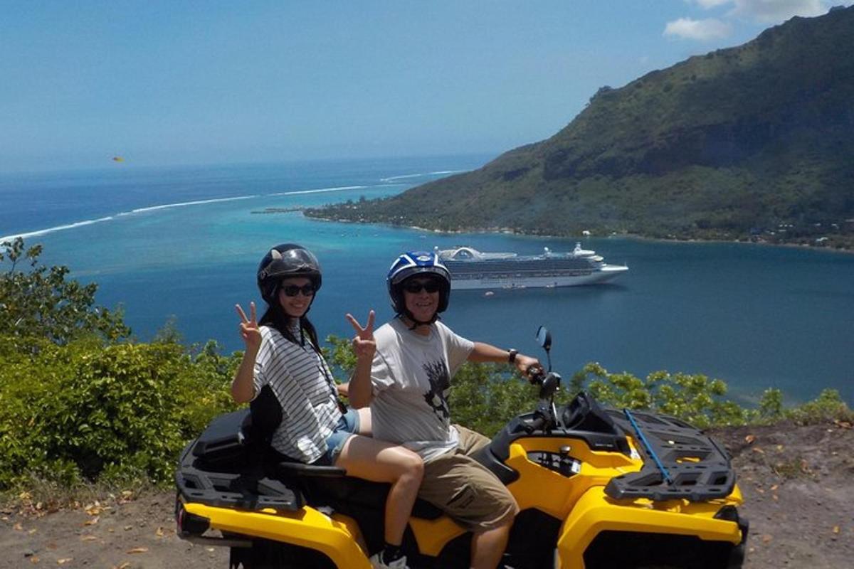 two people on a motorcycle with the peace signs