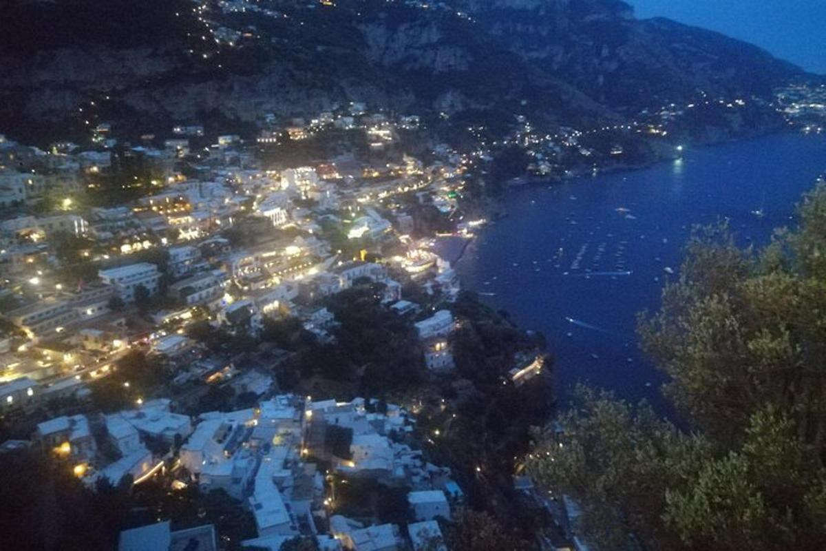 a view of a city at night with a river