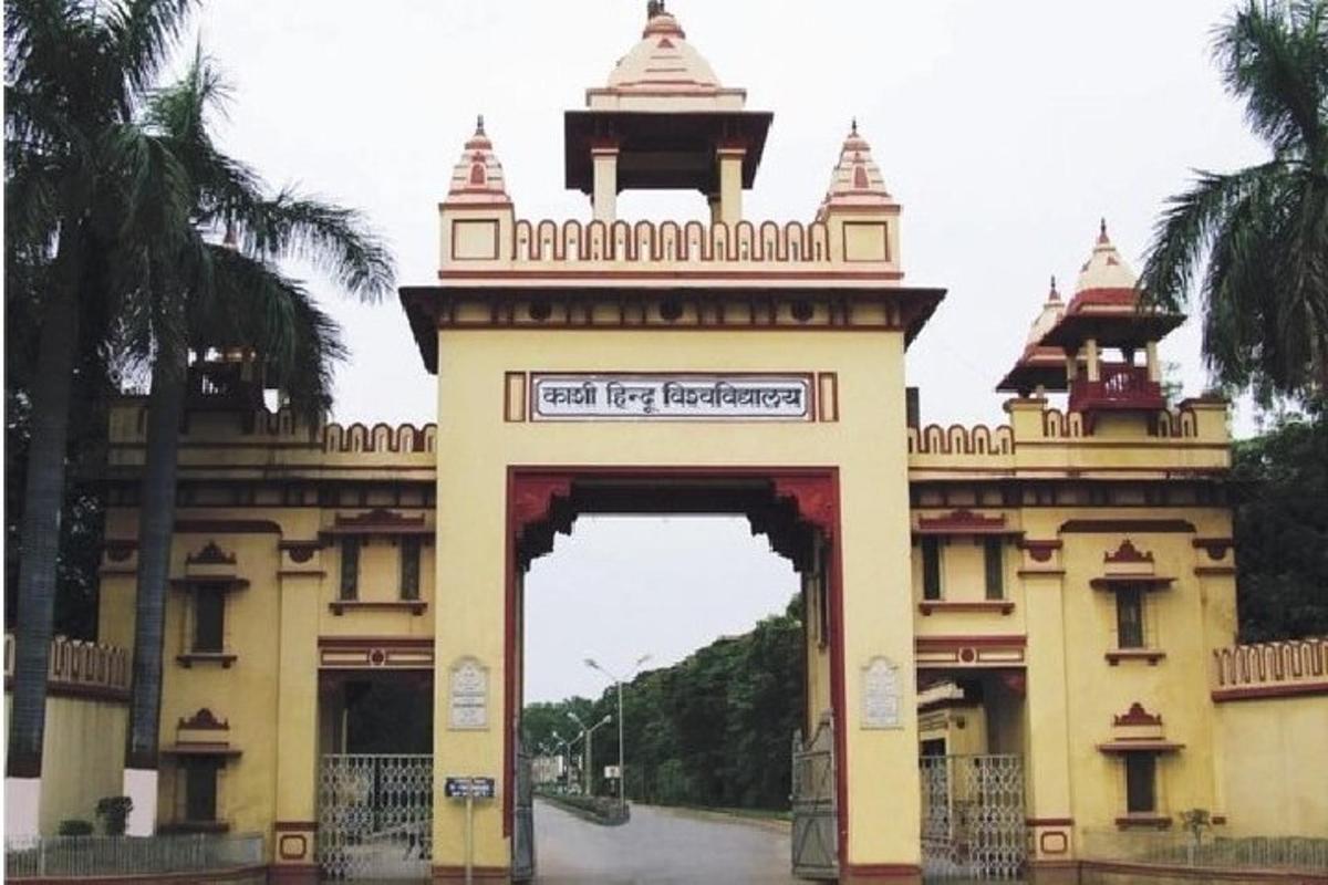 an entrance to a building with a gate