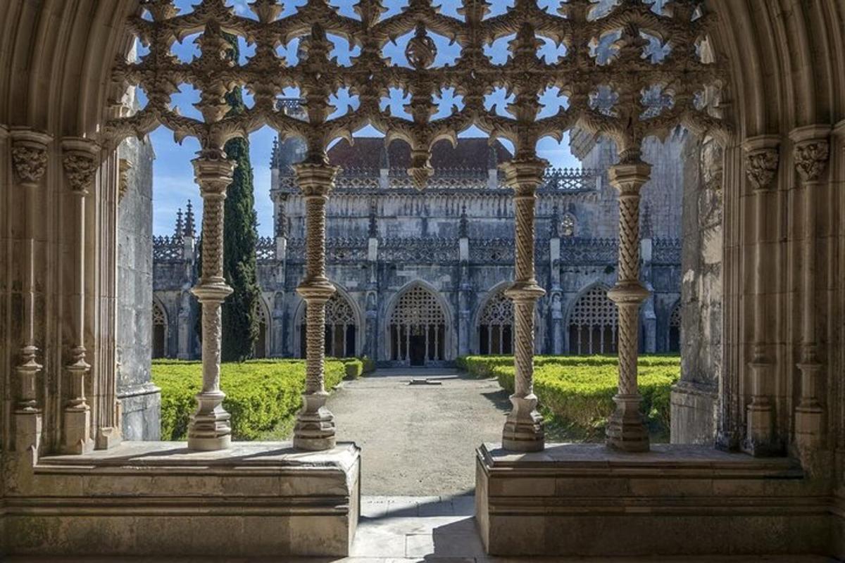 a view of a building with columns and a courtyard