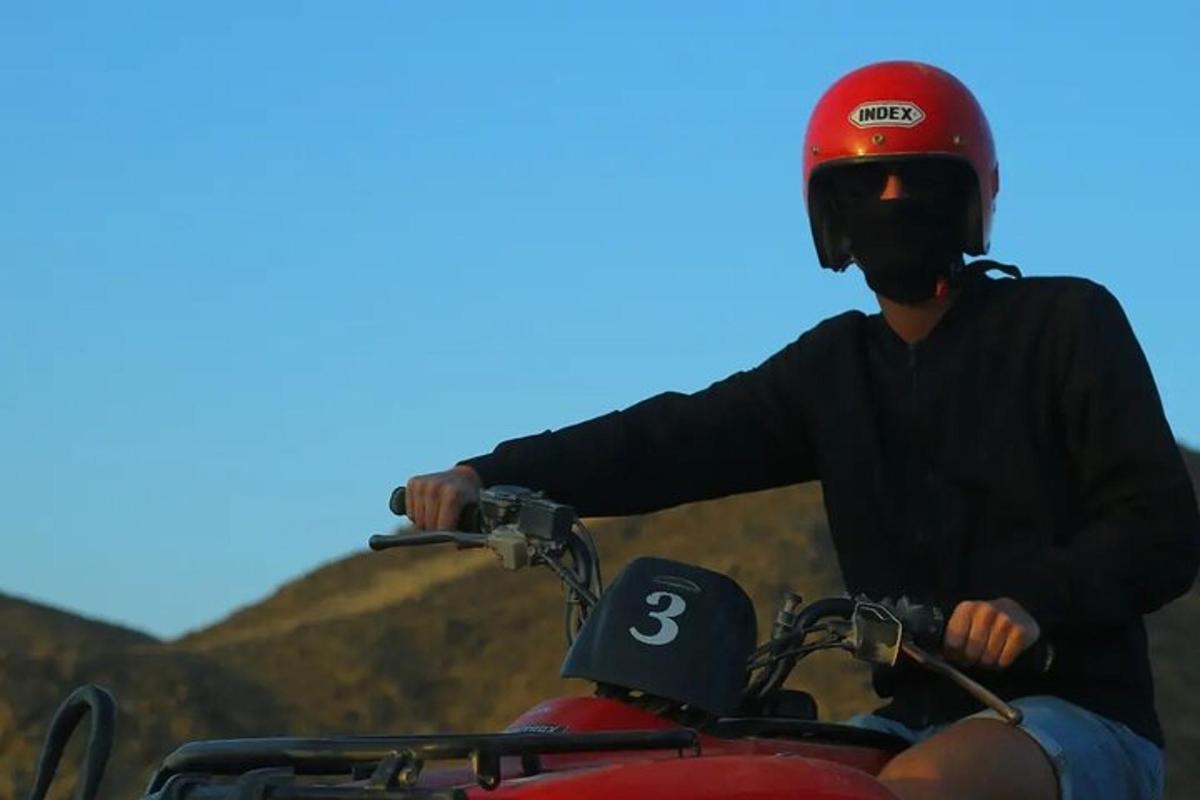 a person wearing a helmet on a motorcycle