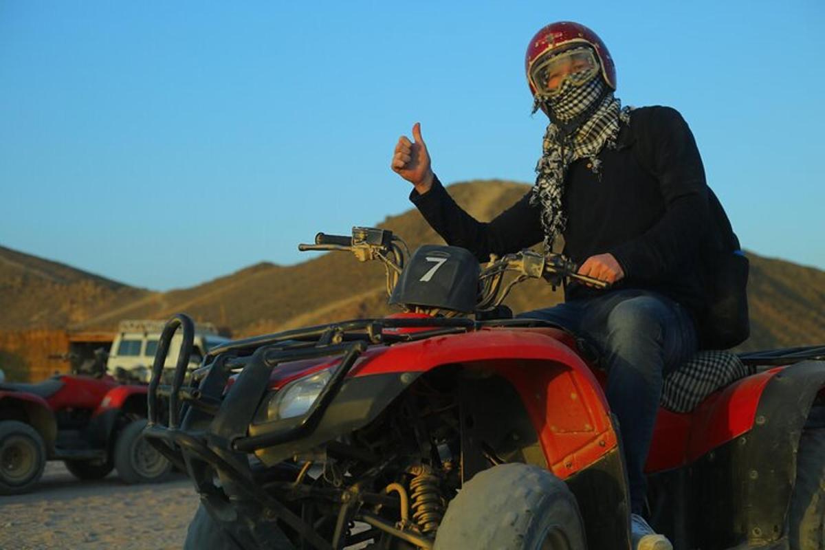 a person on a atv with a mask on