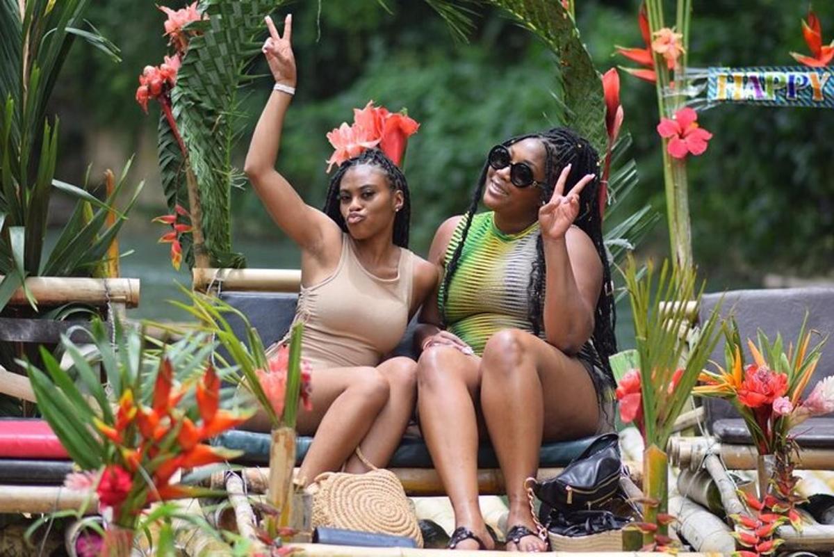 two women in bathing suits sitting on a bench