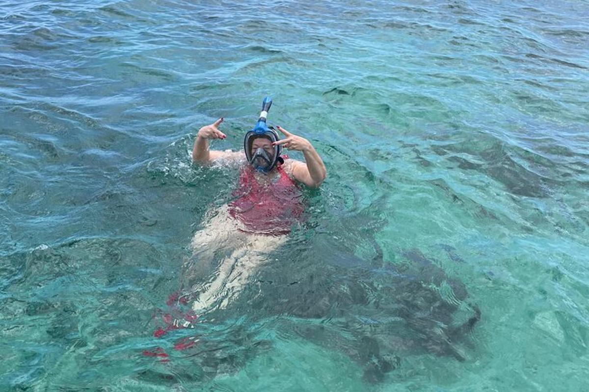 a person in the water with a camera
