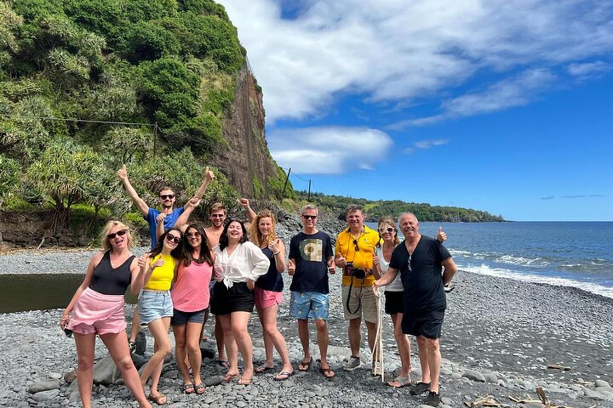 a group of people standing on a beach