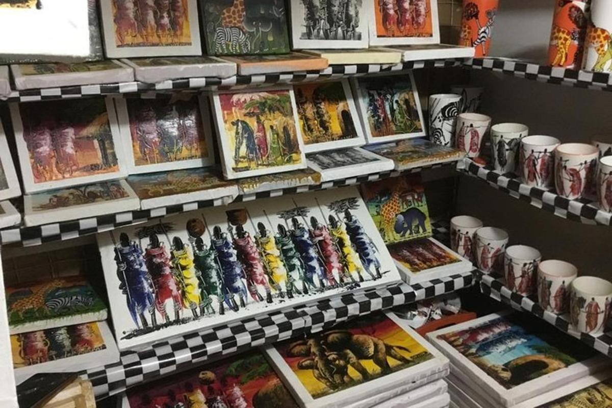 a display of comic books and art on a shelf