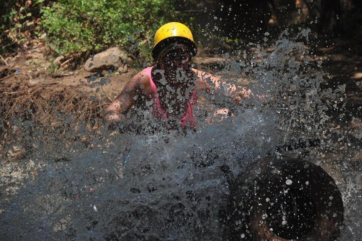 a person in a yellow helmet in the water