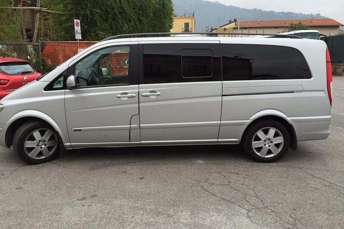 a white van parked in a parking lot