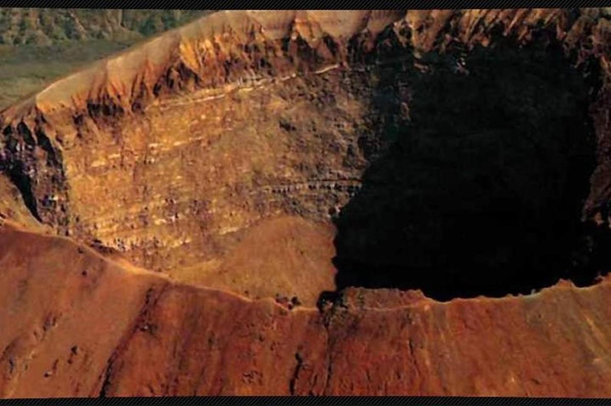 a large hole in the side of a rock
