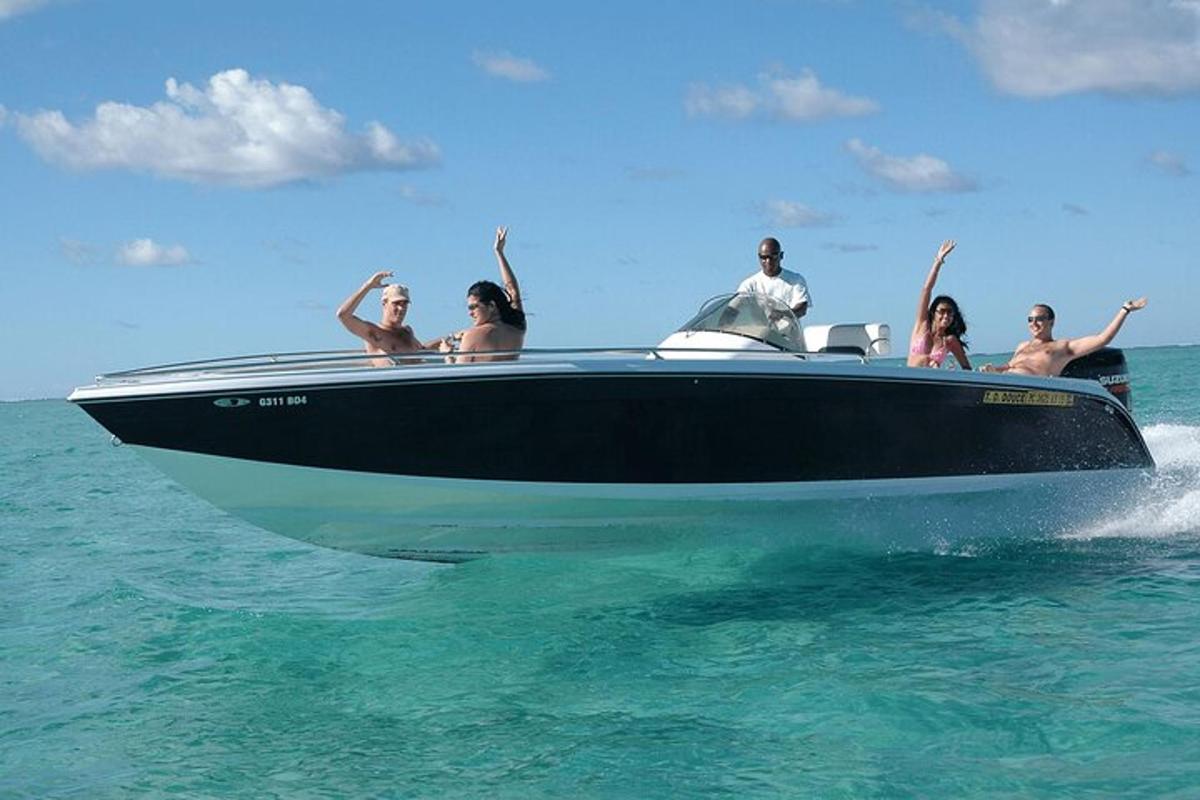 a group of people on a boat in the water