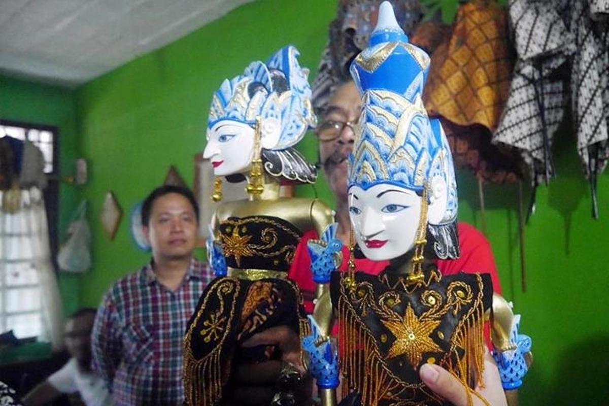 a group of people dressed in costumes in a room