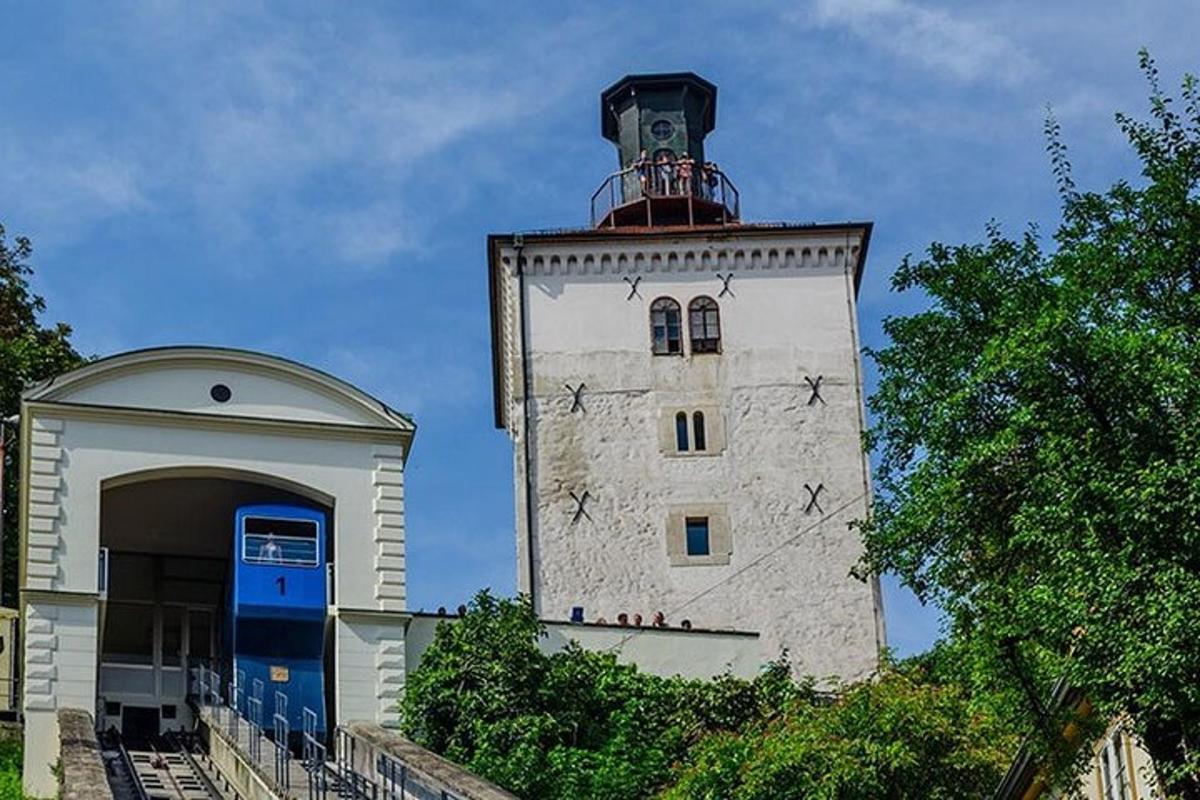 a building with a clock tower with stars on it