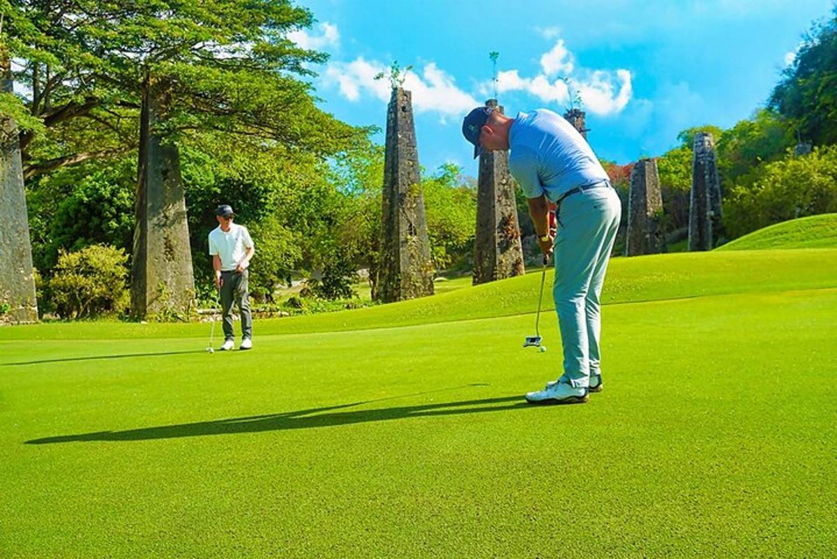 two men playing golf on a golf course