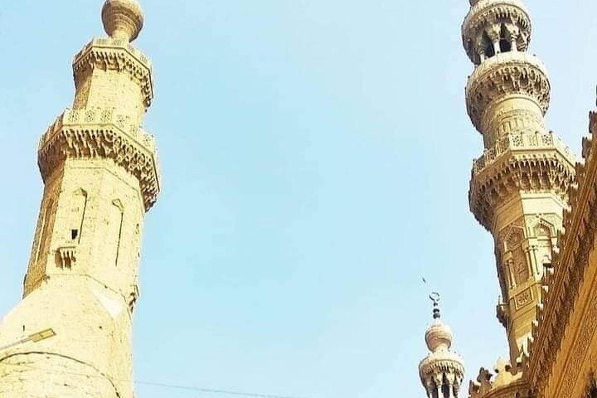 a building with two minarets and a mosque